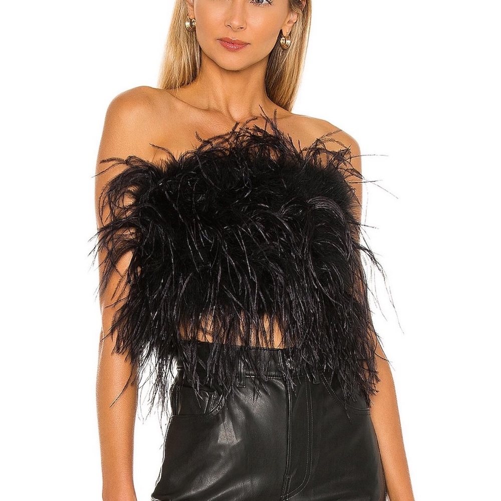 Never worn Feather top zips in the back from Revolve